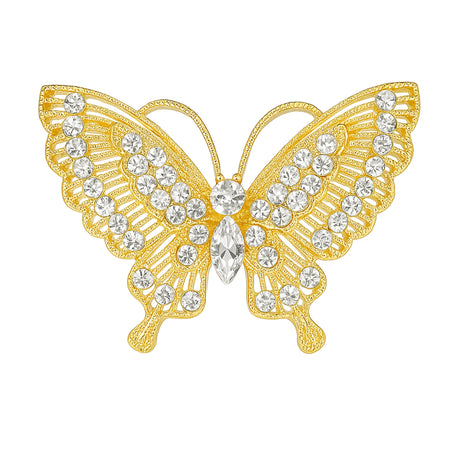 Butterfly brooch with gold-tone metal finish and clear faceted stones in varying sizes, cutout on white background.