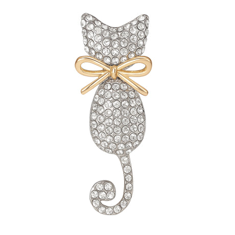 Cat-shaped brooch with silver-tone metal base, clear round stones, and a gold-tone bow, cutout on white background.