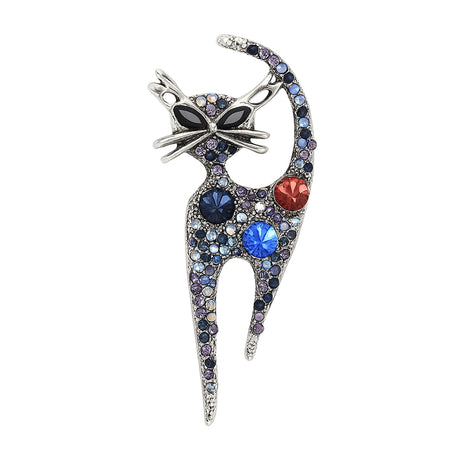 Cat brooch with blue round stones in silver-tone metal base, and a large round red-brown accent stone, cutout on white.