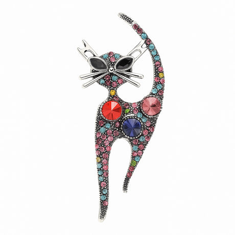 Cat brooch with silver-tone outline, multicolor faceted stones including red and pink accents, cutout on white.