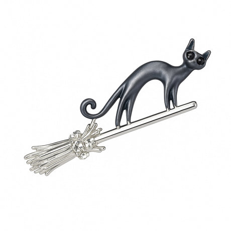 Cat brooch with sleek black enamel body on silver-tone metal broomstick accented with clear round stones, isolated on white background.