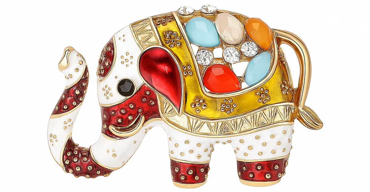 Elephant brooch with red, gold-tone, and white enamel accents, multicolor decorative stones, and textured dot detailing, cutout on white background. Landscape crop for secondary use.