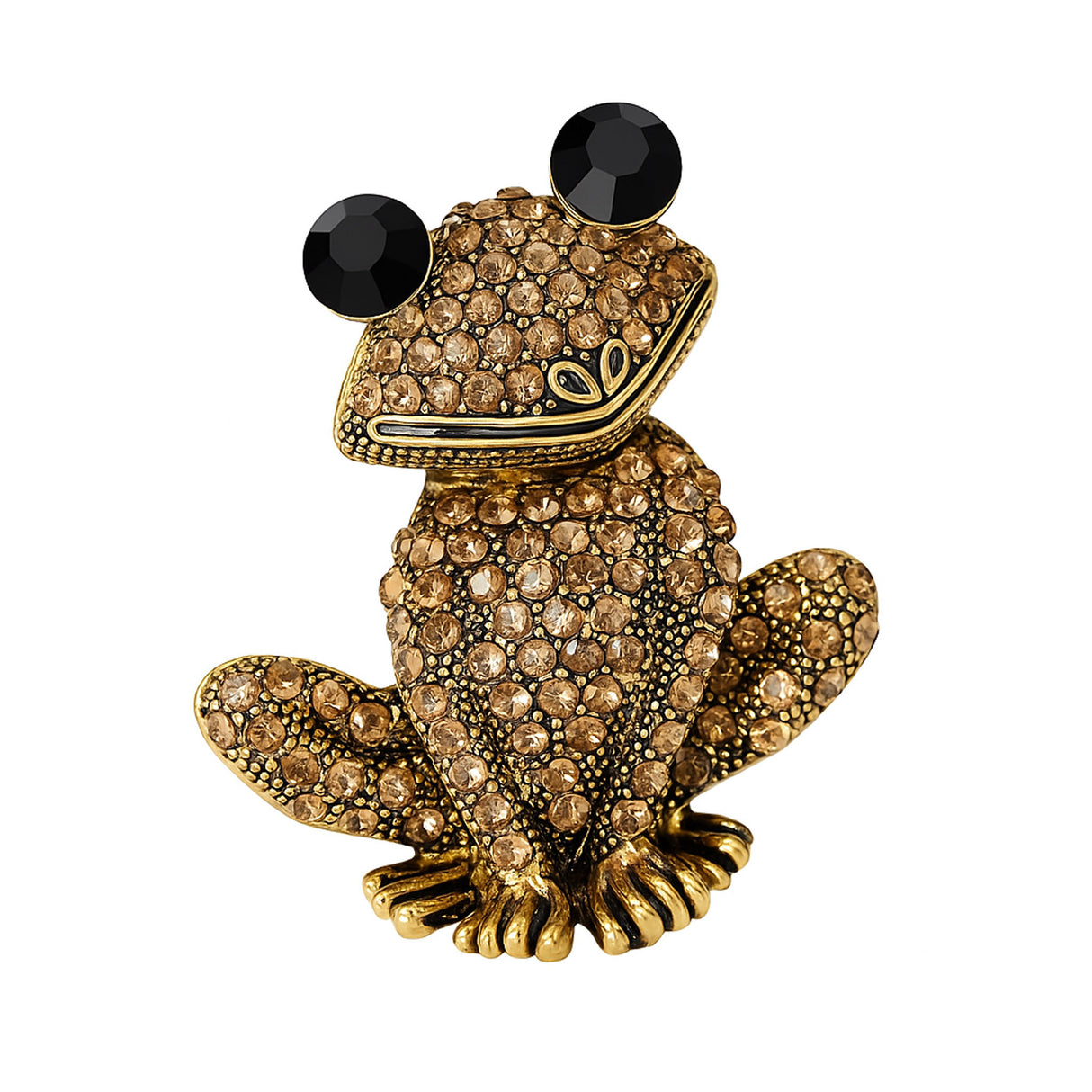 Frog brooch in gold-tone metal with clustered beige faceted stones and black round eyes, cutout on white background.