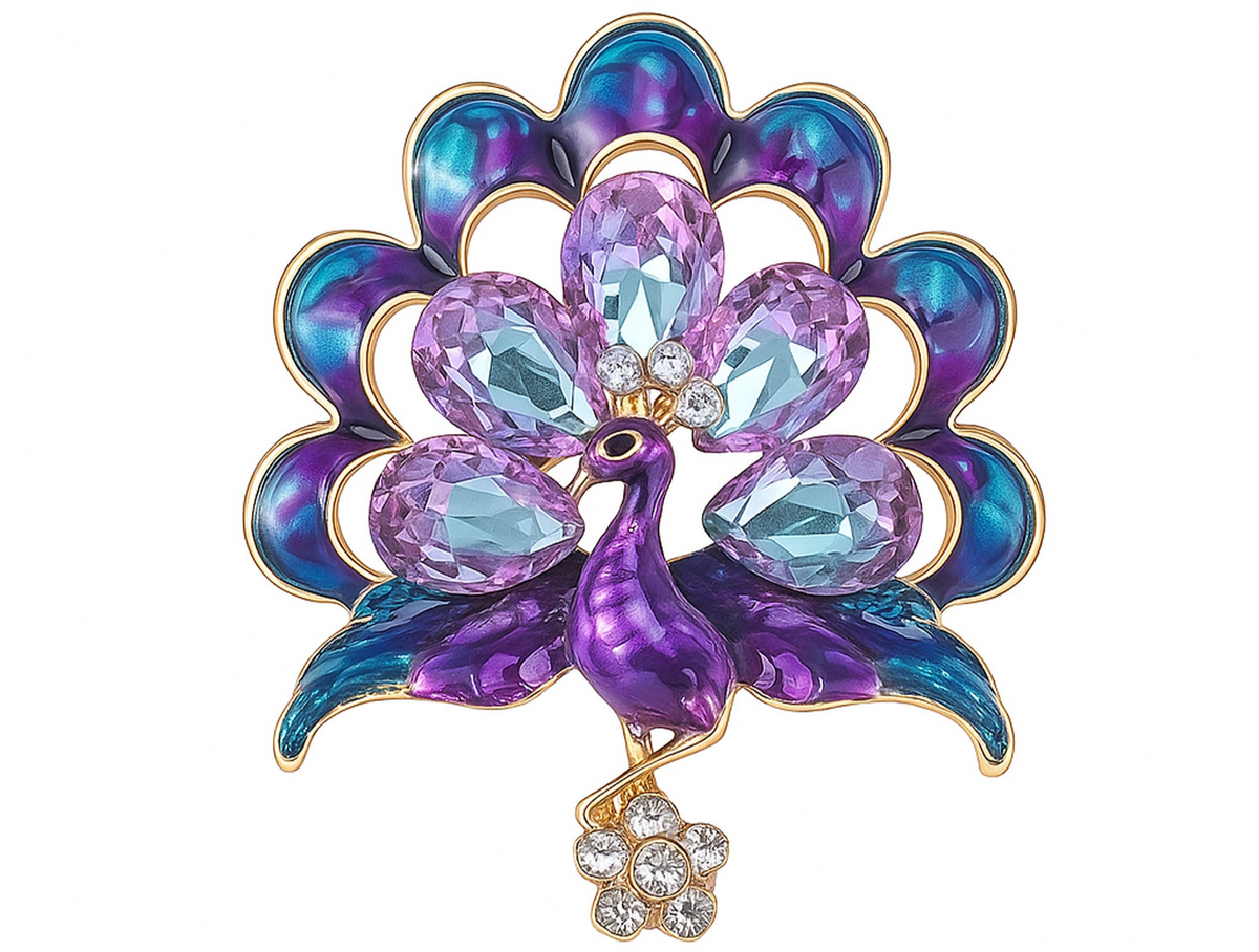 Peacock brooch with purple and blue enamel feathers, accented by large faceted stones, and flower drop with small clear stones. Cutout on white. Landscape crop for secondary use.