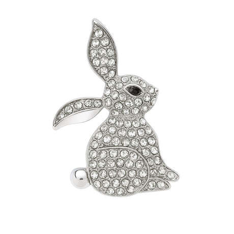 Bunny brooch in silver-tone metal with clear faceted stones and black eye detail, cutout on white background.