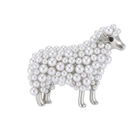 Sheep brooch with silver-tone metal, white round beads, and clear accent stones on ear, cutout on white background.