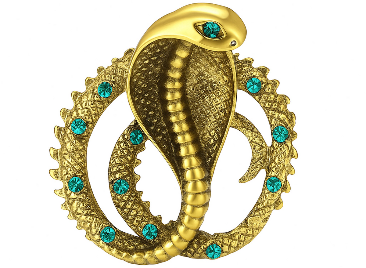 Cobra-shaped snake brooch with antique-inspired gold-tone metal finish, and teal-green faceted stones. Cutout on white background. Landscape crop for secondary use.