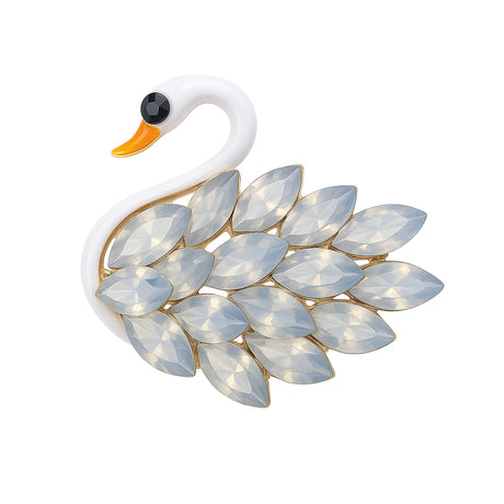 Swan brooch with white enamel body, orange beak, and translucent light stones, cutout on white background.