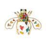Bee brooch in white enamel with gold-tone frame, rainbow heart inlays, and multicolor faceted stones, cutout on white.