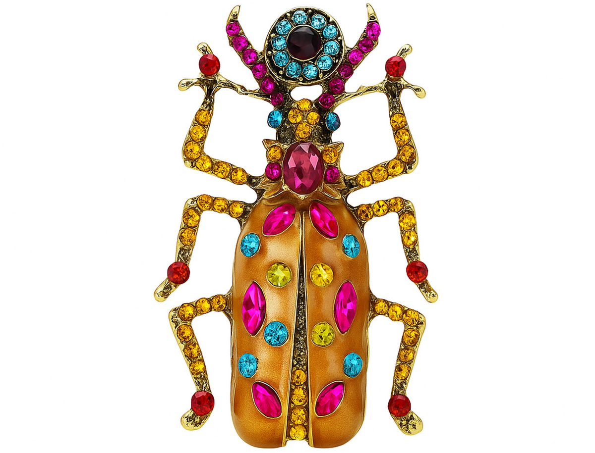 Beetle brooch with orange wings, multicolor stones in pink, yellow, red, and blue tones, cutout on white background. Landscape crop for secondary use.