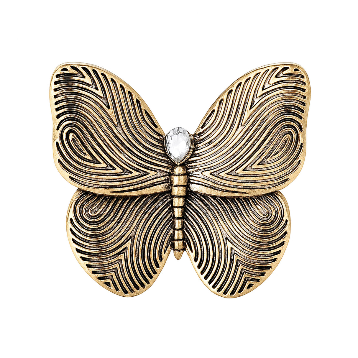 Butterfly brooch with gold-tone finish, black etched swirl wings, and clear teardrop stone, cutout on white.