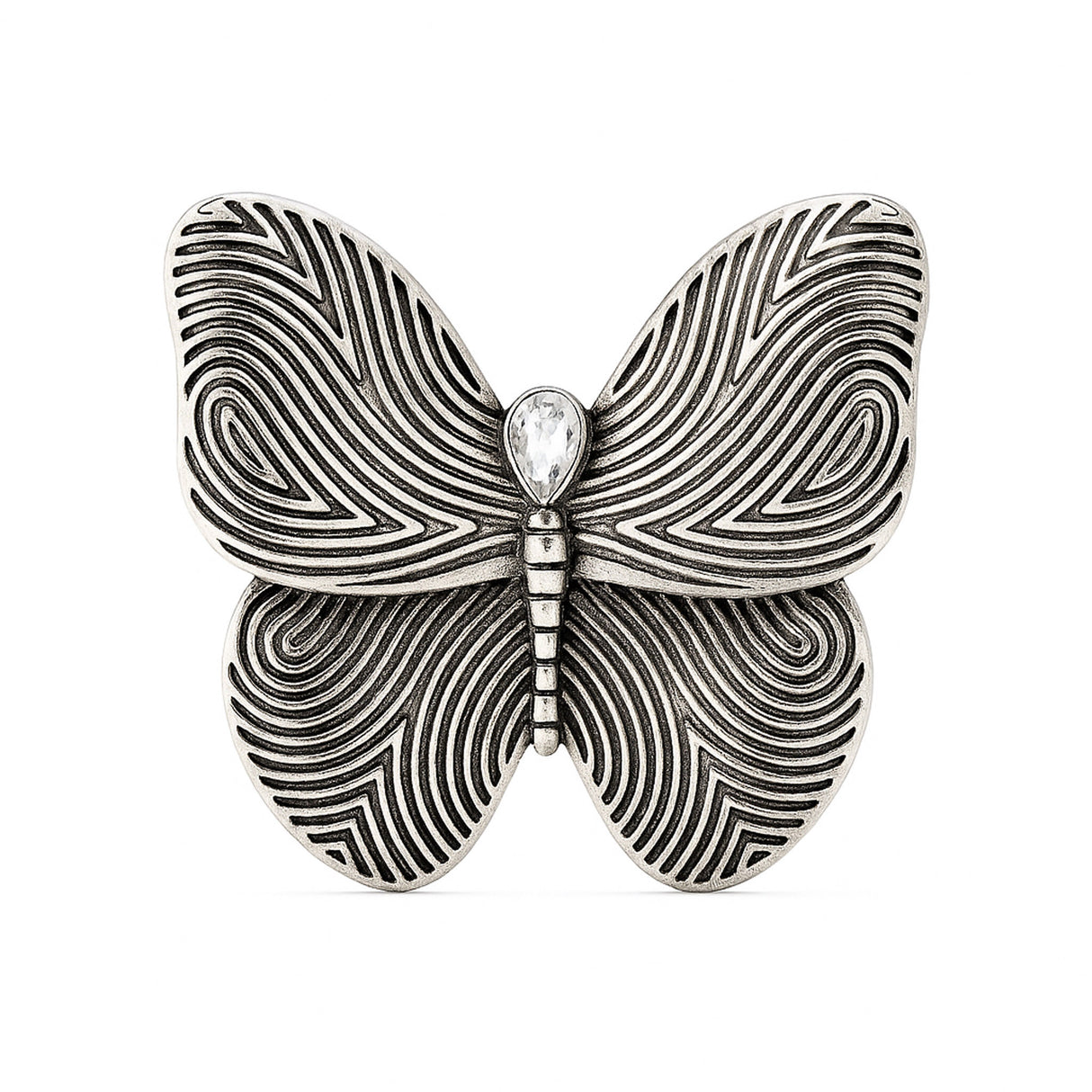 Butterfly brooch with silver-tone finish, black etched swirl wings, and clear teardrop stone, cutout on white.