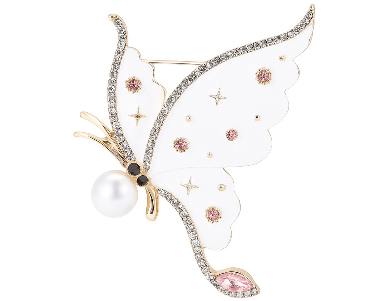 Butterfly brooch with white wings, pink round stones, clear teardrop detail, and faux pearl accent, cutout on white background. Landscape crop for secondary use.