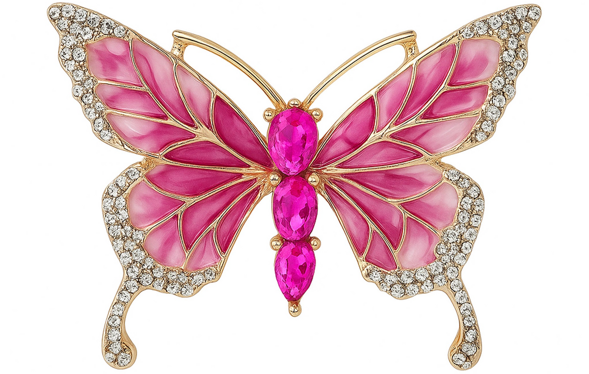 Butterfly brooch with pink enamel wings, gold-tone metal frame, small clear round stones along edges, and three large pink oval faceted stones as the body, cutout on white. Landscape crop for secondary use.