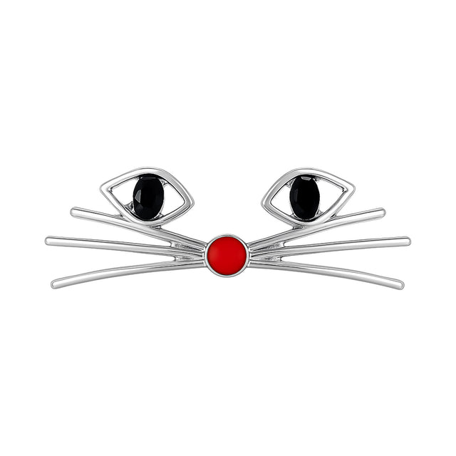 Cat face brooch with silver-tone metal, black oval stones for eyes, and red round enamel nose, cutout on white.