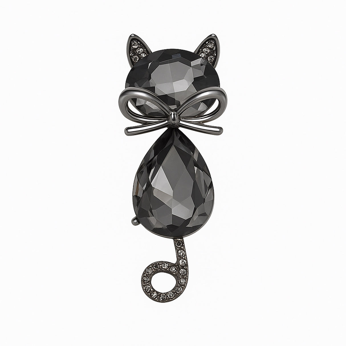 Cat brooch with black faceted stones, gunmetal-tone bow detail, and curled tail with clear stones, cutout on white.