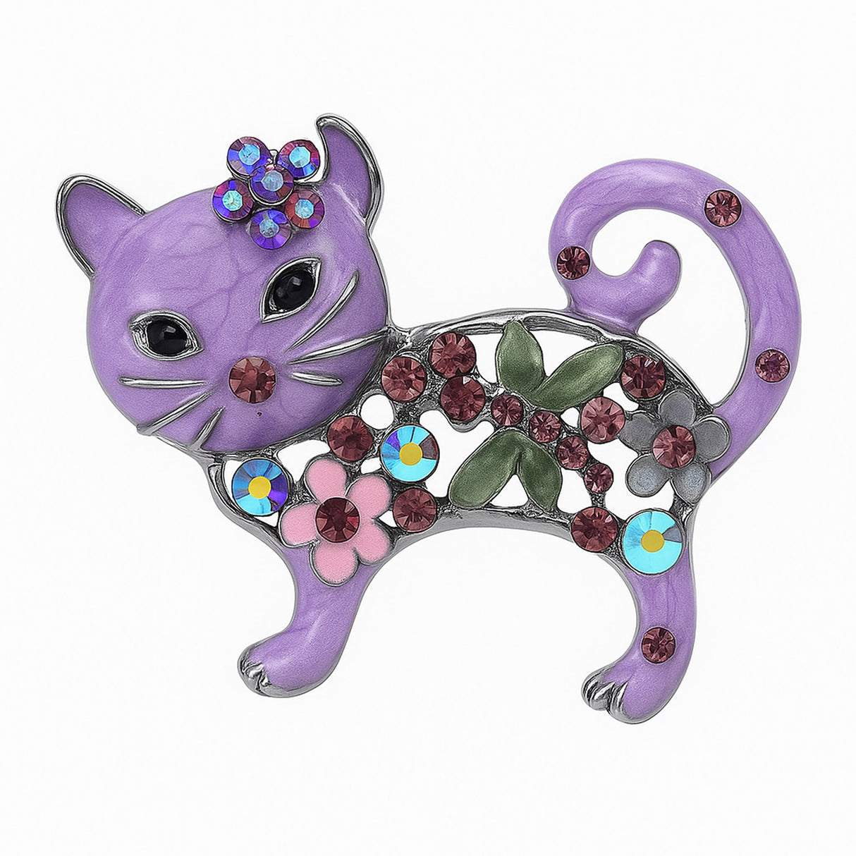 Cat brooch with purple enamel, pink faceted stones and flower accents, and green leaf motif, set in silver-tone metal. Cutout on white.