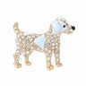 Dog brooch with light blue enamel accents, clear decorative stones, and gold-tone detailing, cutout on white.