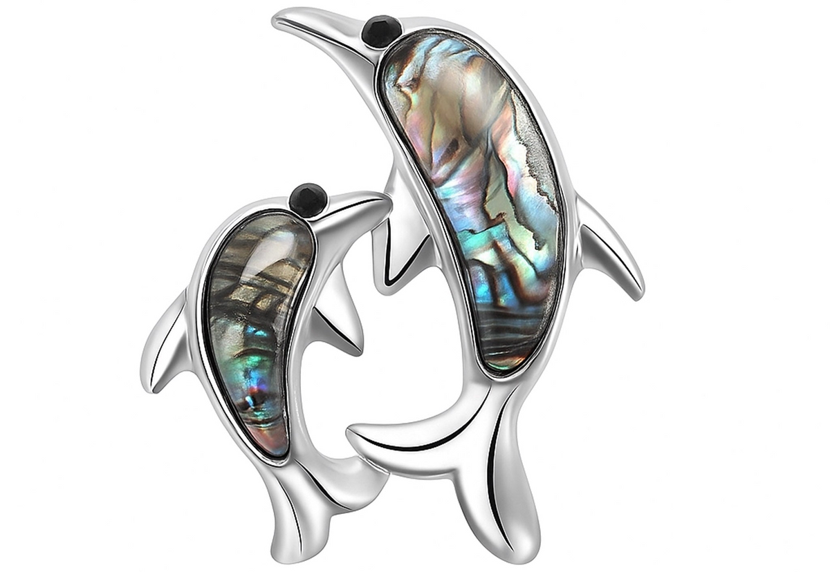 Dolphin brooch with silver-tone outline, black eyes, and vibrant multicolor inlay suggestive of faux abalone shell, front-facing cutout on white background. Landscape crop for secondary use.