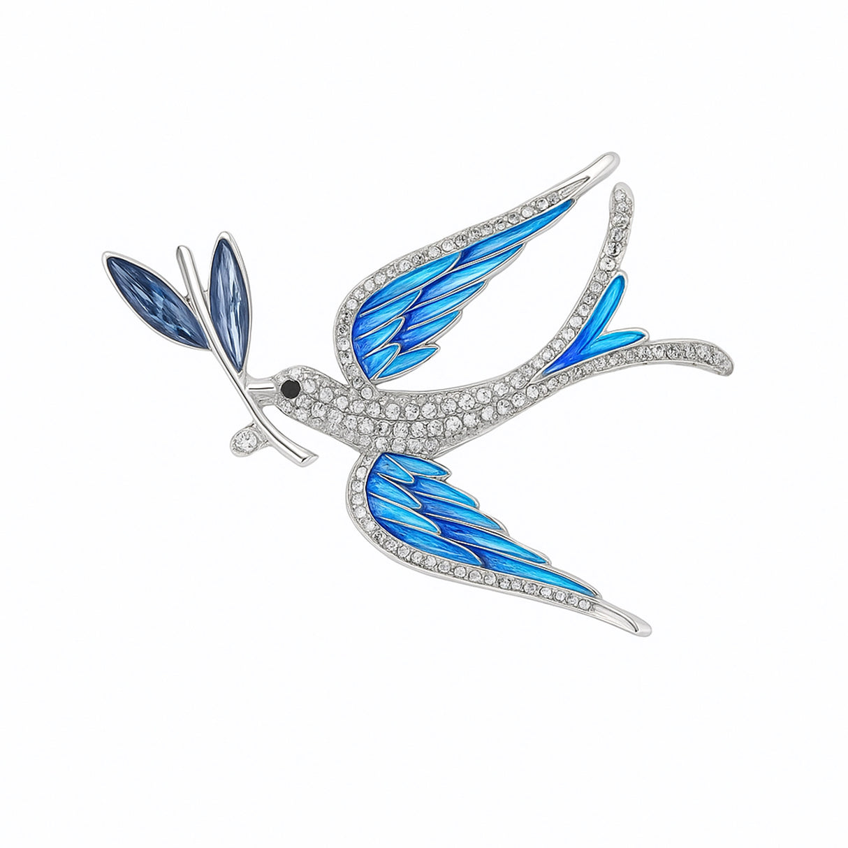 Dove brooch with blue-toned wings, clear faceted stones on body, and blue leaf detail, cutout on white background.