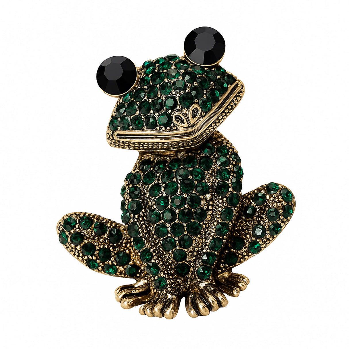 Frog brooch with gold-tone metal finish, dark green faceted stones, and black round eyes, cutout on white.