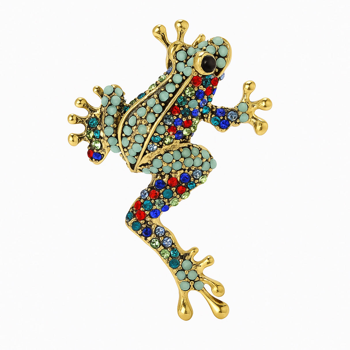 Frog brooch with gold-tone metal base, covered in green and multicolor round stones, cutout on white.