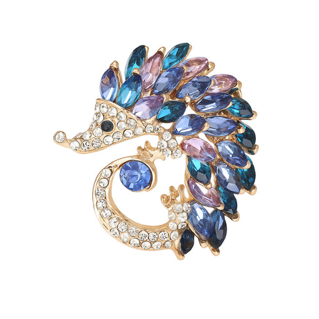 Hedgehog brooch in gold-tone metal with clear faceted stones and marquise stones in blue and purple, cutout on white.