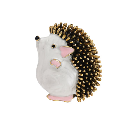 Hedgehog brooch featuring white body, pink accents, and black spines with gold-tone tips, cutout on white background.