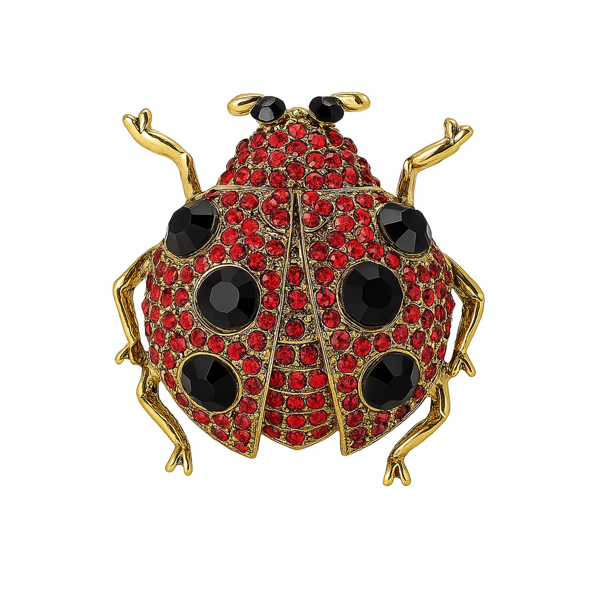 Ladybird brooch with gold-tone metal, red base, black faceted stones, and black eyes, cutout on white.