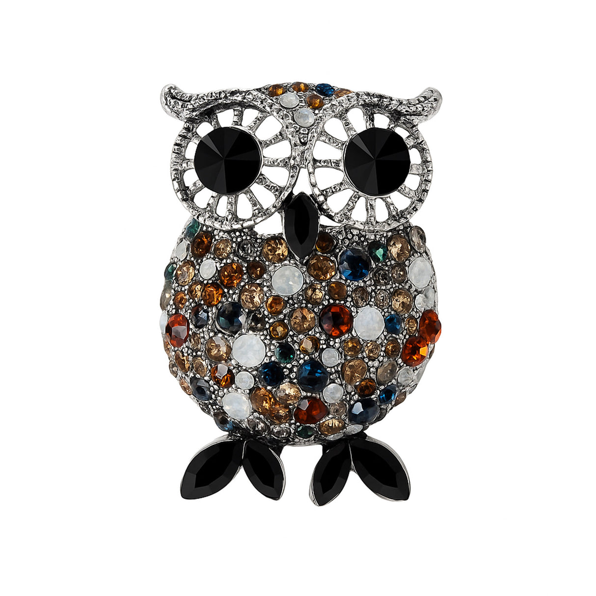 Owl brooch with silver-tone frame, large black eyes, and multicolor faceted stones including brown, amber, blue and white, with black oval stones with pointed tips for feet, cutout on white.