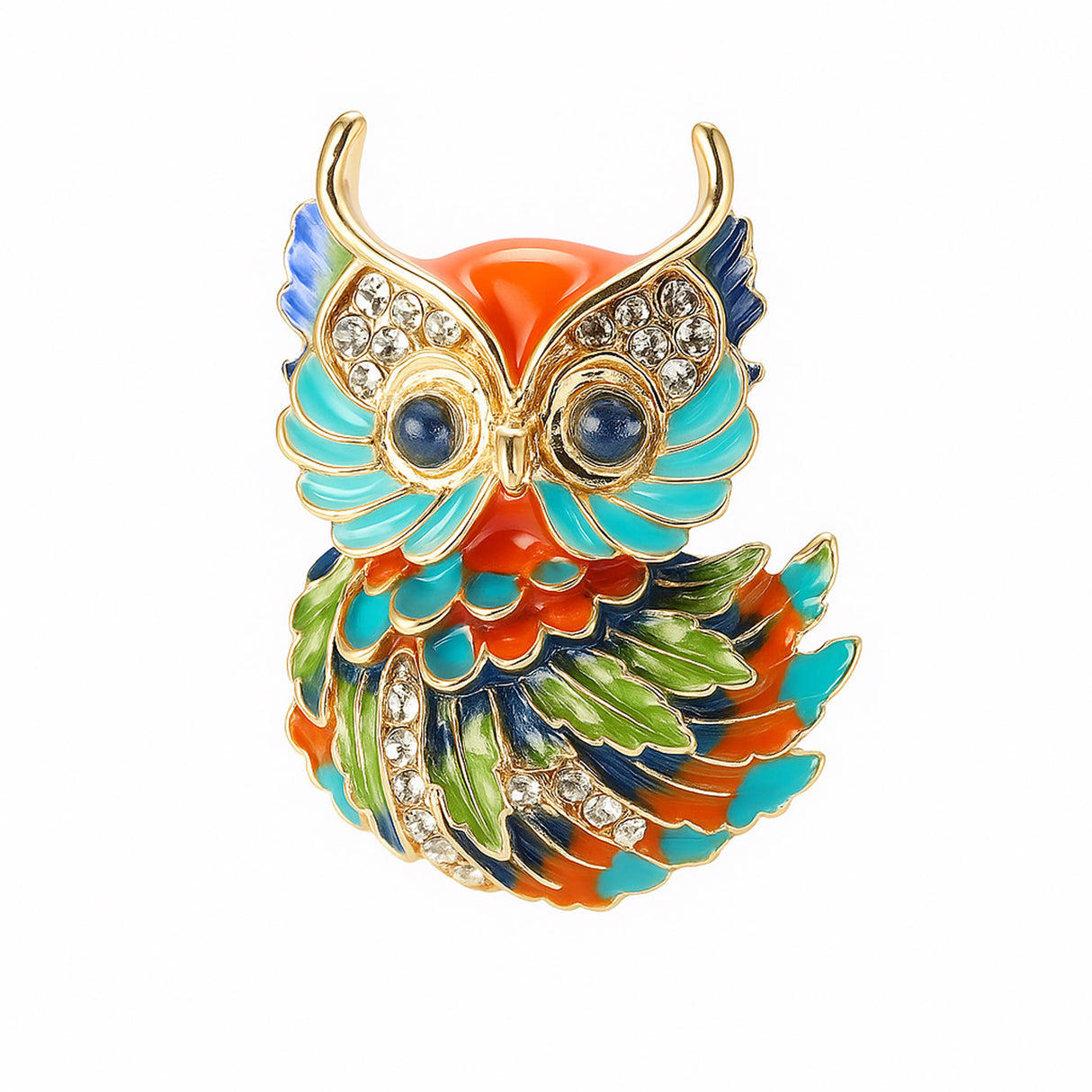 Owl brooch with gold-tone outline, orange and turquoise enamel accents, green and navy feather details, clear faceted stones, and round blue eyes, cutout on white.