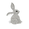 Bunny brooch in silver-tone metal with clear faceted stones and black eye detail, cutout on white background.