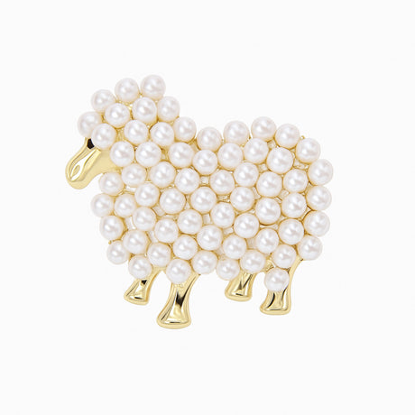 Sheep brooch with gold-tone metal and white round beads clustered in a textured pattern, cutout on white.
