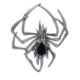 Spider brooch with dark silver-tone metal and black teardrop-shaped faceted center stone, cutout on white background.