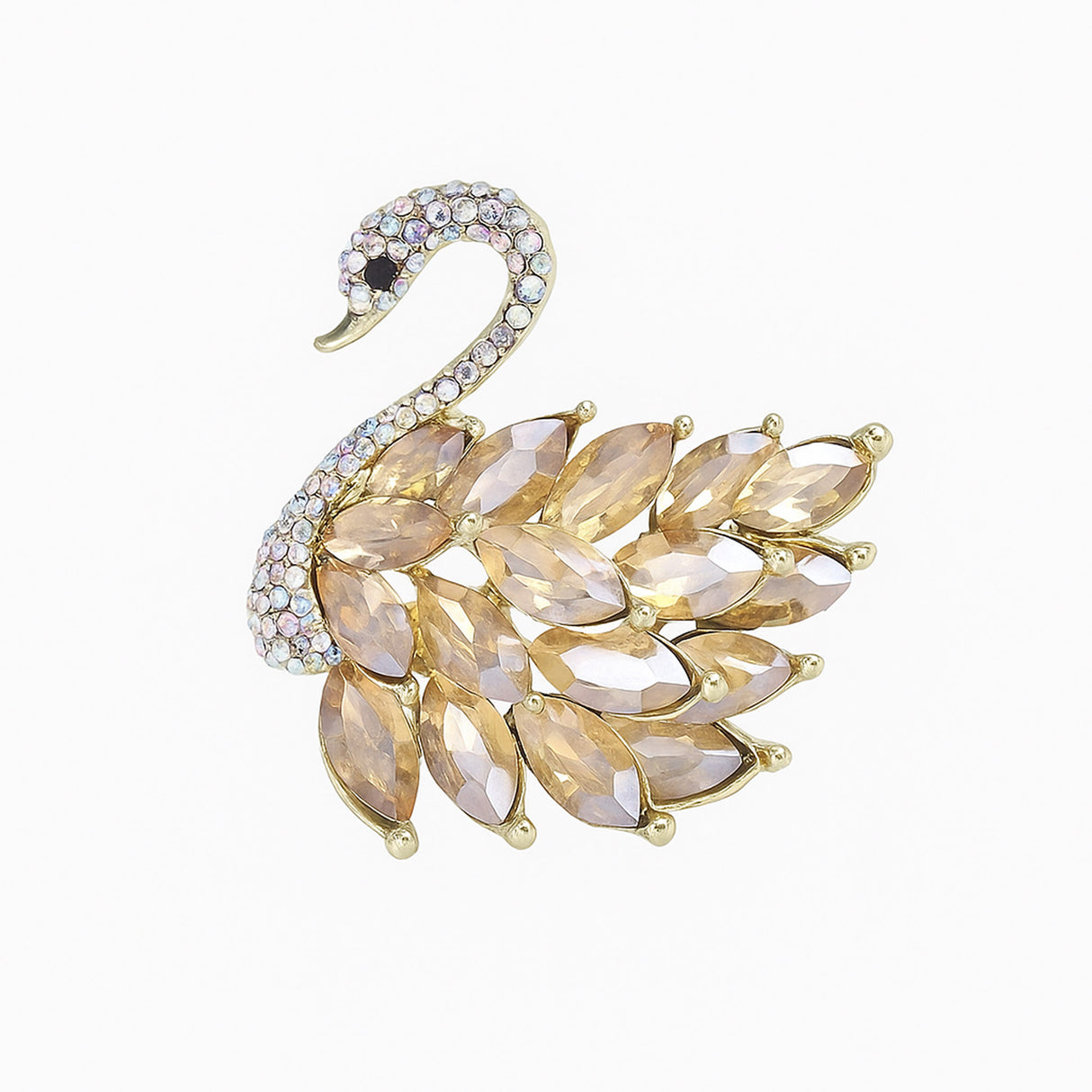 Swan brooch with gold-tone metal base, light amber-colored marquise-cut faceted stones, and crystal-paved neck, cutout on white.