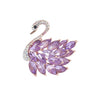 Swan brooch with rose gold-tone metal finish, purple marquise-cut faceted stones, and pavé detailing, cutout view.