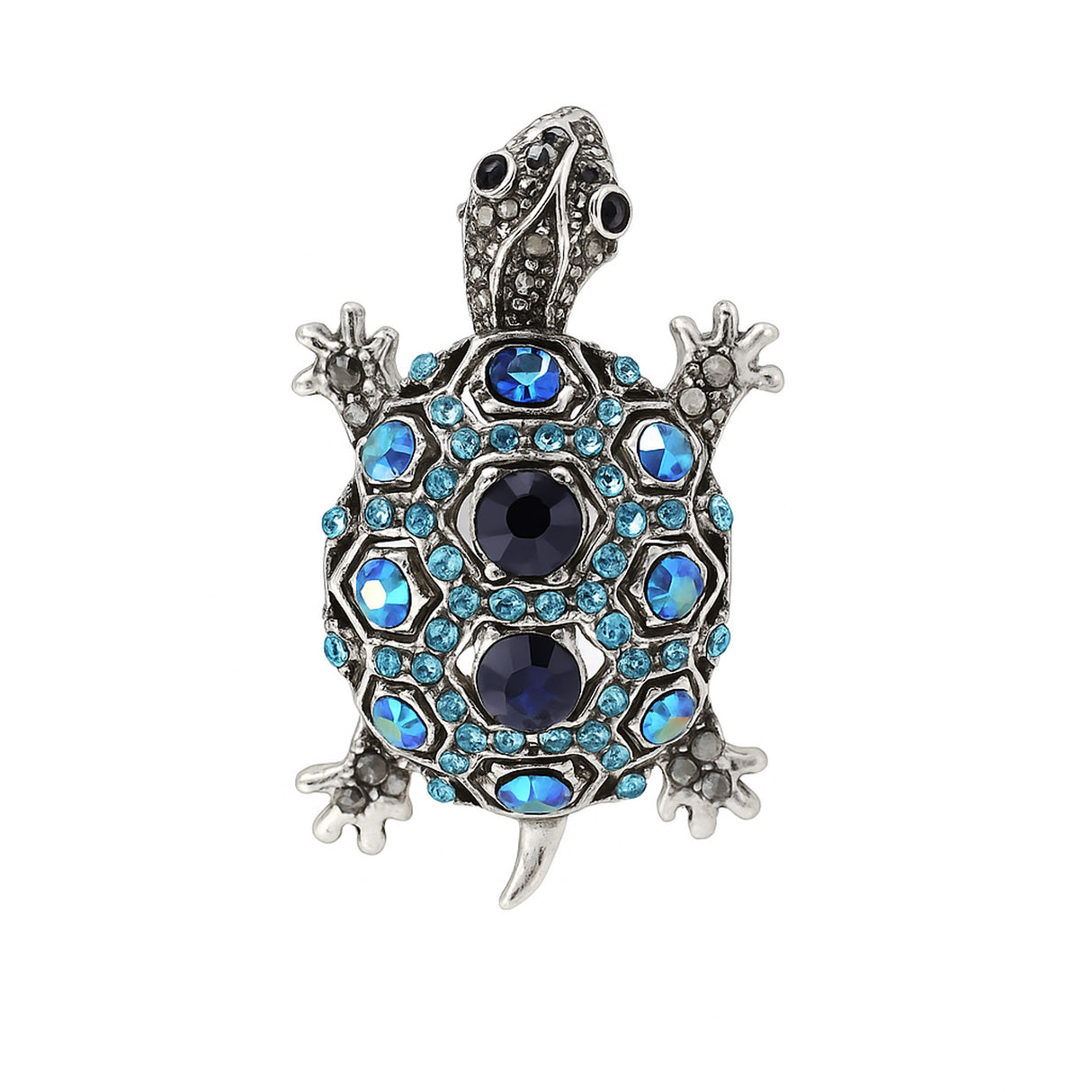 Tortoise brooch with silver-tone metal finish, dark blue center stones, and light blue faceted accents, cutout on white.