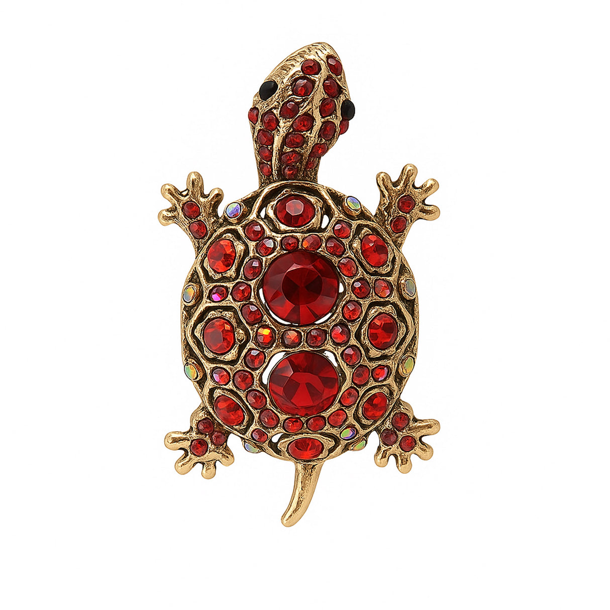 Tortoise brooch with gold-tone metal finish, red faceted center stones, and round red accents, cutout on white.