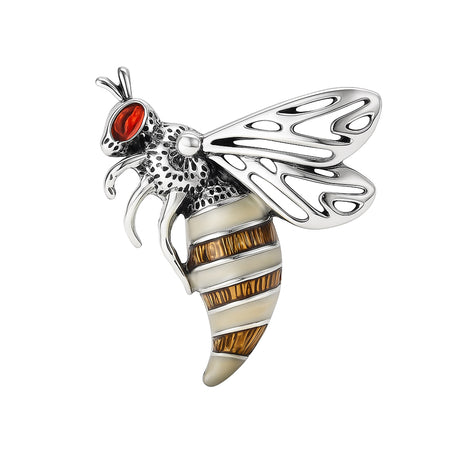 Wasp brooch with silver-tone finish, red eye detail, white and amber-tone enamel stripes, and openwork wings, cutout on white.
